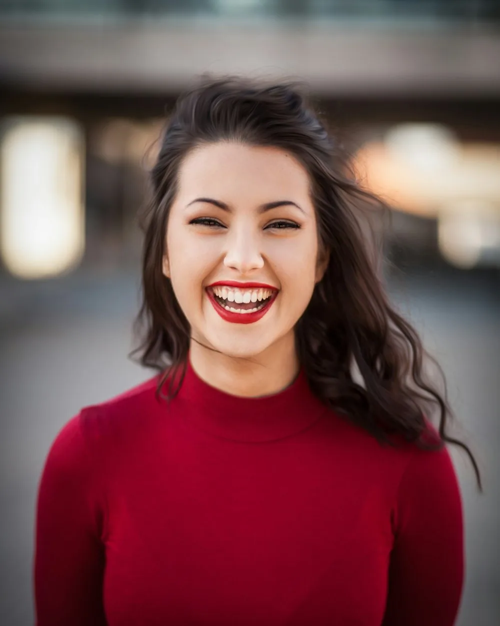 A person smiling outdoors